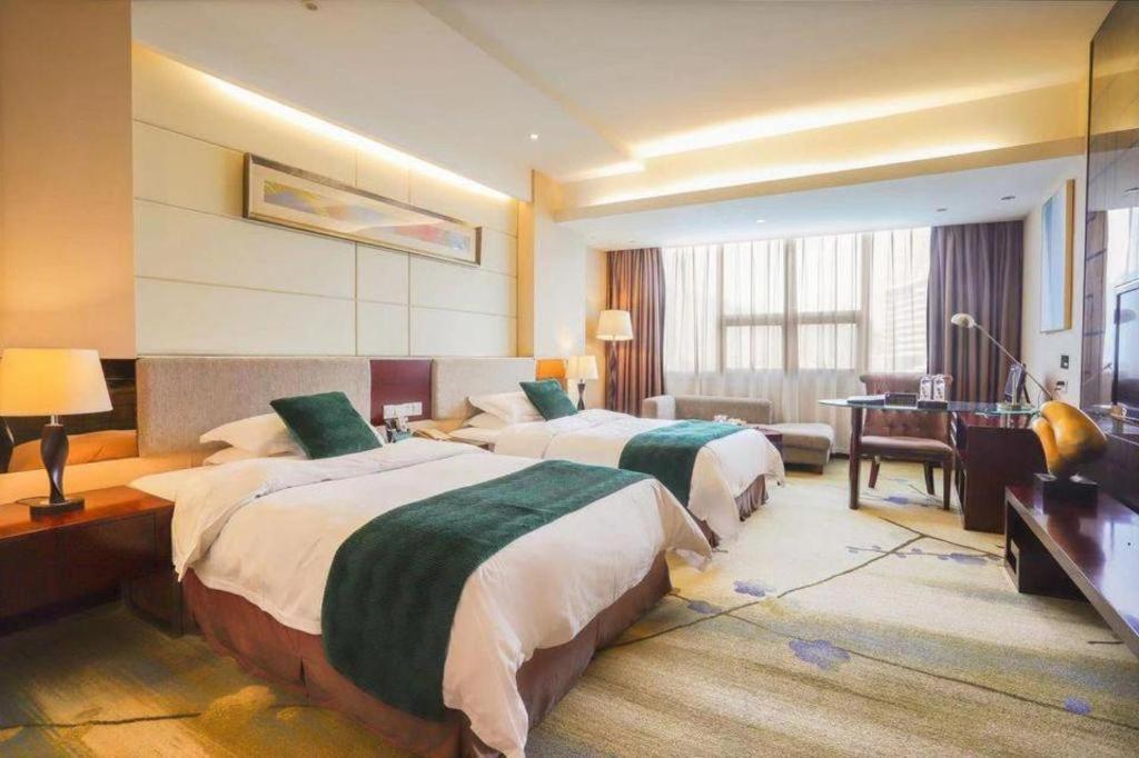 Fortune Hotel Лунъян Экстерьер фото