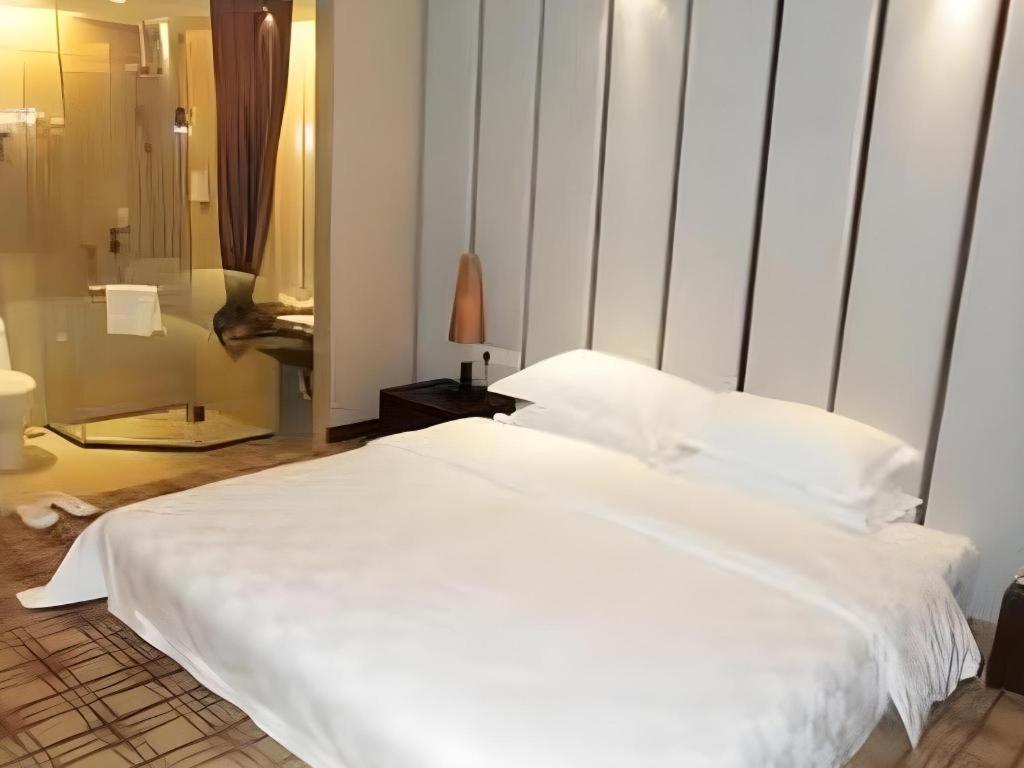 Fortune Hotel Лунъян Экстерьер фото