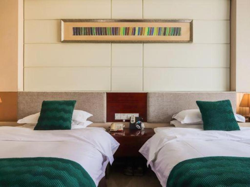 Fortune Hotel Лунъян Экстерьер фото