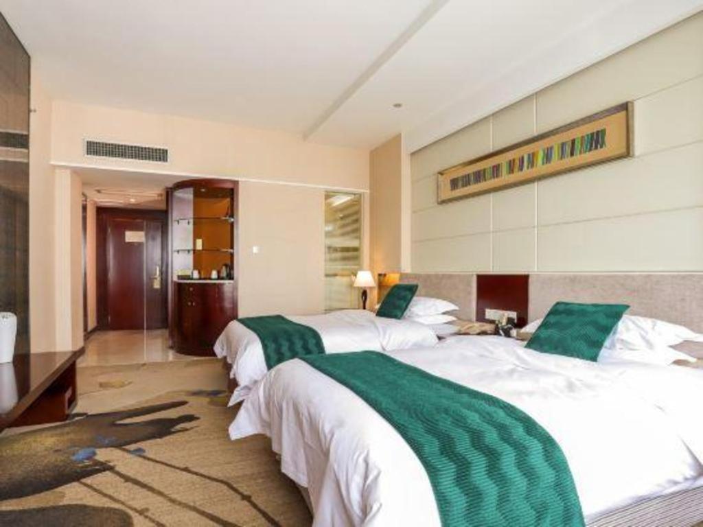 Fortune Hotel Лунъян Экстерьер фото