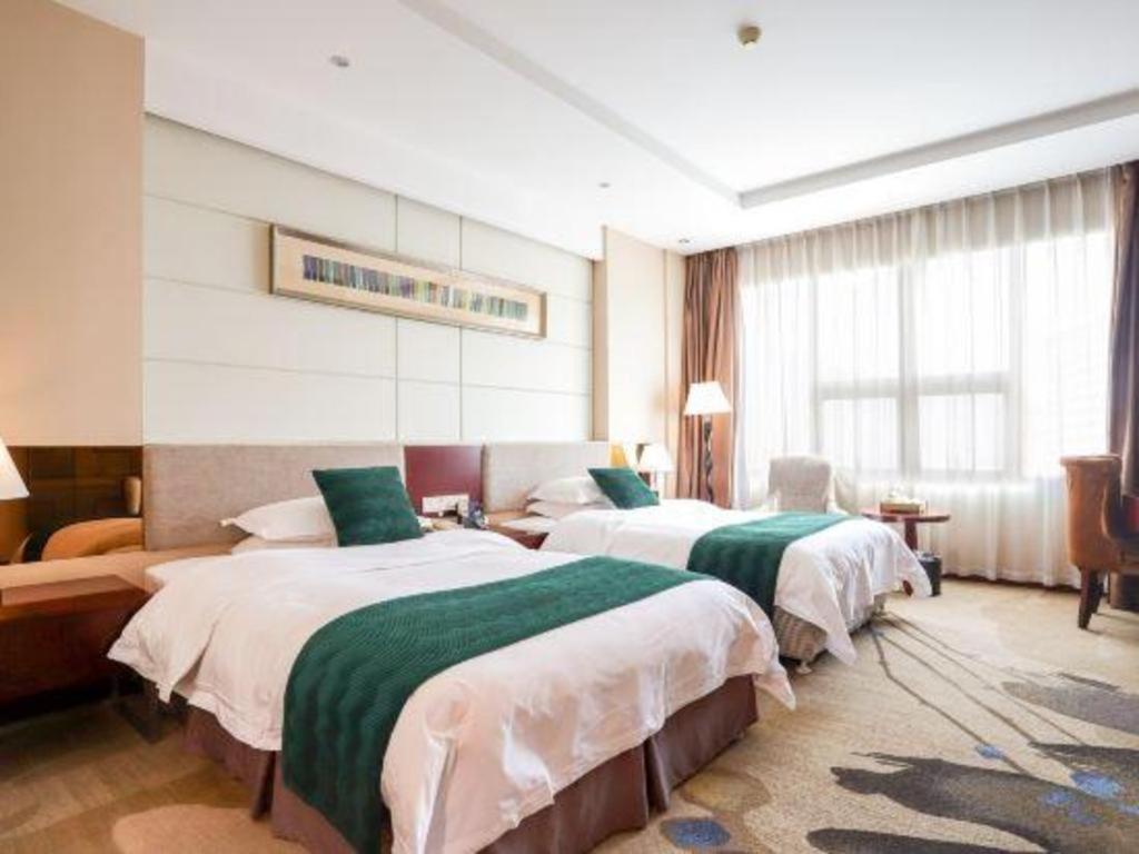 Fortune Hotel Лунъян Экстерьер фото